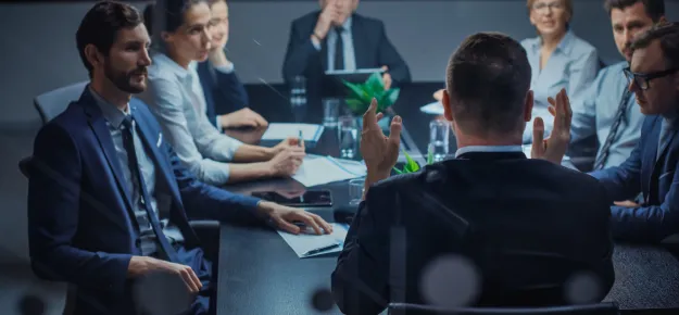 people around a conference table