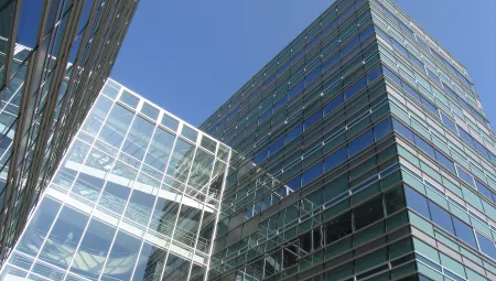 view looking up at glass office building
